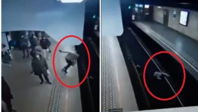 Deliberately pushed the woman onto the rails as the train entered the station! Train driver activates SAFETY BRAKE (VIDEO)