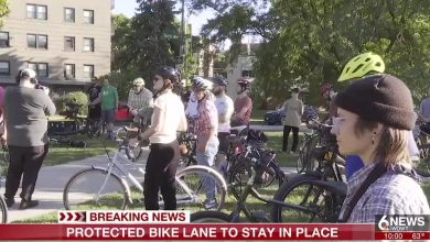 Residents in Omaha protest against protected bike lane removal