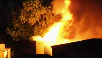 Miami-Dade confirmed that an overnight fire Saturday destroyed multiple cars and two mobile homes on two properties
