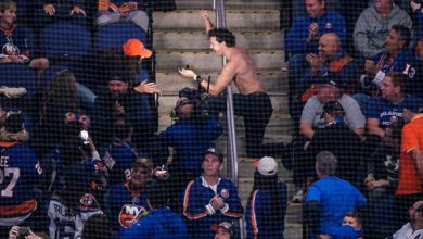 Young man took off his shirt and proposed to his girlfriend at a New York Islanders hockey game, she got up and ran away