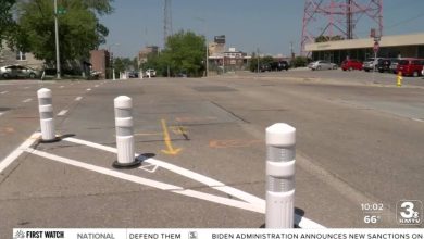 The protected bike lane on Omaha’s Harney will remain in place. For now.